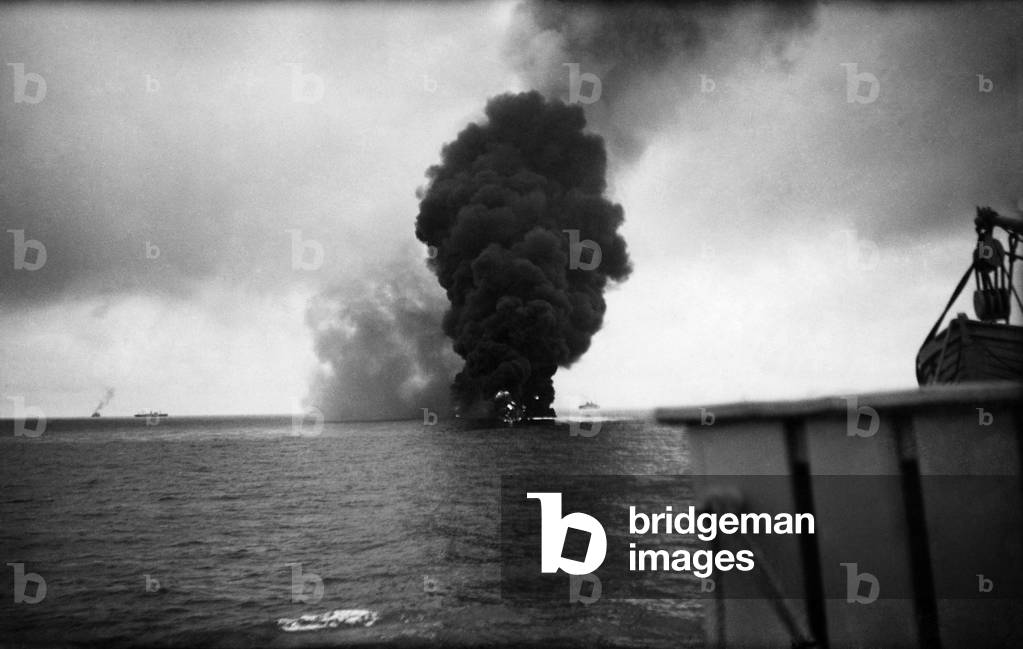 World War II: Shipping A Oil tanker a blaze after being torpedoed by a German U-boat in the North Atlantic. July 1940 P011673