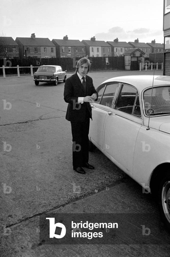 John Fitzpatrick, Manchester United half back arriving at Old Trafford to collect his car after today's F. A. hearing at Derby. November 1969 (photo)