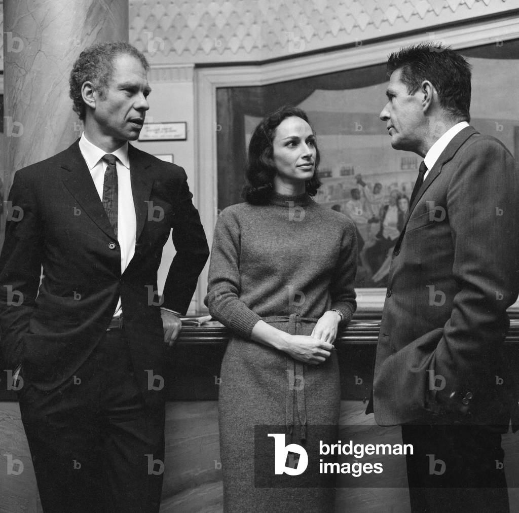 American dance choreographer Merce Cunningham (left) pictured with Carolyn Brown and John Cage at the Saville Theatre where Cunningham and his dance company will open their London season. 21st November 1966 (b/w photo)