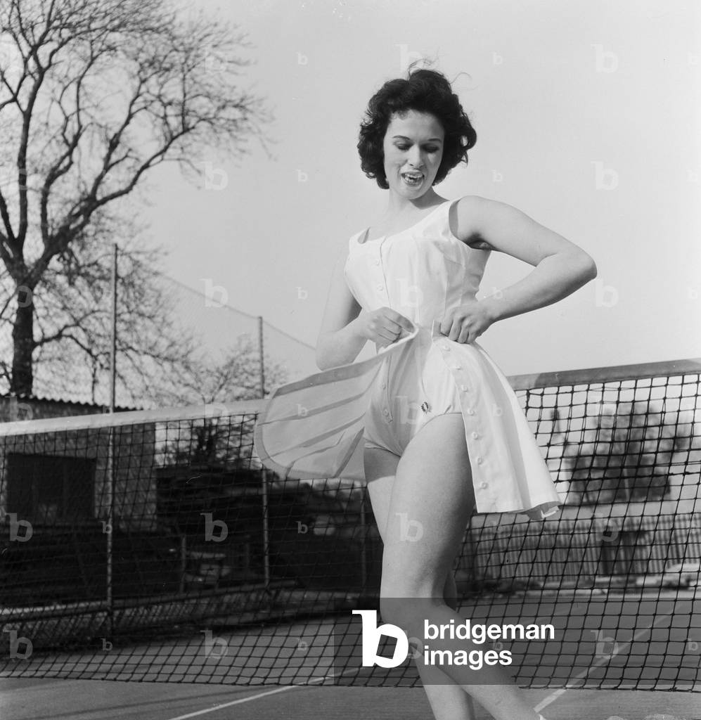 Norma Parnell (20) actress & model, wearing romper outfit which was designed by former tennis champion Fred Perry, pictured 8th April 1957 (b/w photo)