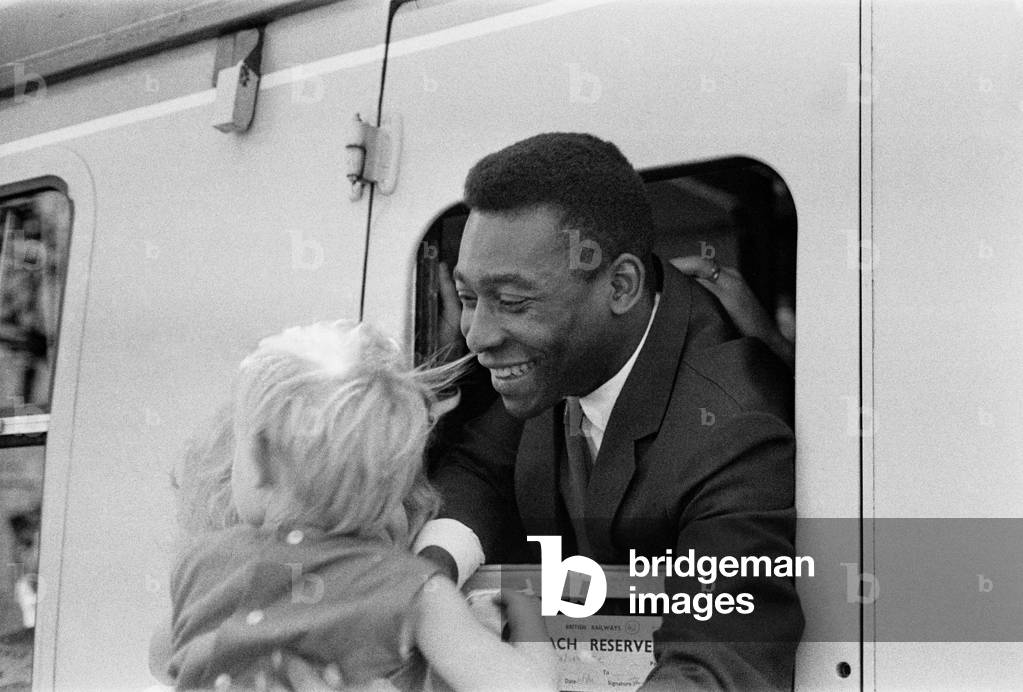 1966 World Cup Tournament in England. Star of the Brazil team Edson Arantes do Nascimento, more commonly known as Pele, pictured at Piccadilly Station in Manchester, after his team were eliminated from the competition. 21st July 1966 (photo)