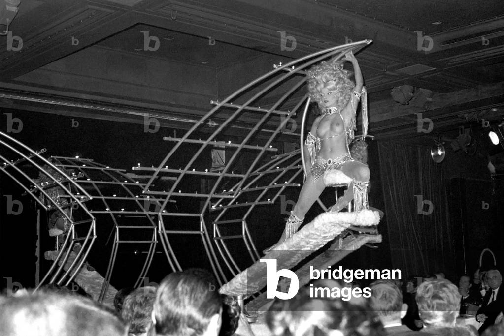 Paris Lido Feature. Cabaret dancers perform on stage at a night club in Pan's, France. December 1969