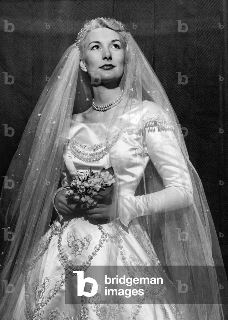 Lana modeling Hertwell wedding dress. 1951
