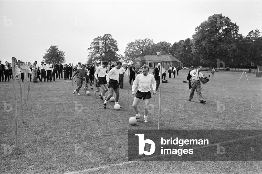 England's preparations for the World Cup finals in July are hotting up. Mr Alf Ramsey, the team manager has gathered 27 players together at Lilleshall, Shropshire, for 12 days of training. He will name 22 next Friday for the Continental tour, and these men, he says, 