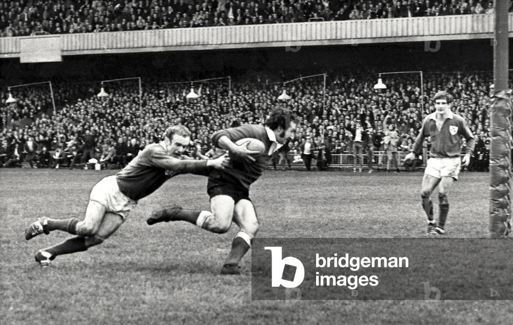 Gareth Edwards and Mike Gibson, during the Triple Crown Match at Cardiff Arms Park, 1971 (b/w photo)