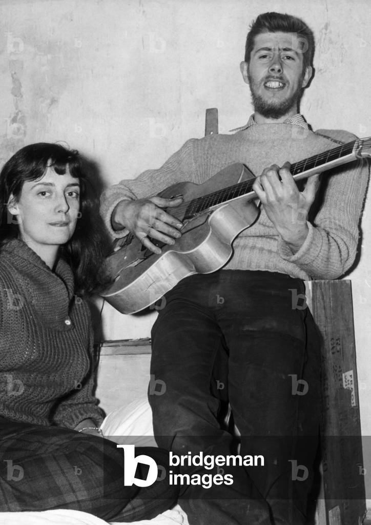 John Mayall aged 23 with his wife Pamela. He went on to form John Mayall & the Bluesbreakers in 1963. 7th May 1956 (b/w photo)
