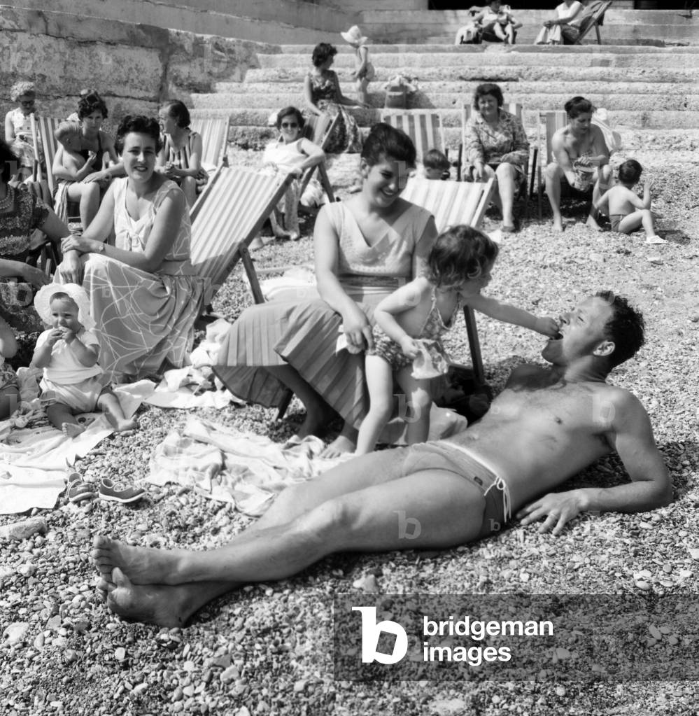 Families on the beach at Plymouth