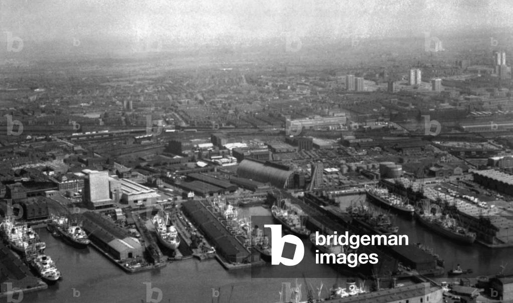 Docks at a standstill in Liverpool on the first day of the national dock strike. Merchant ships line the wharves, idle. 16th May 1966 (b/w photo)