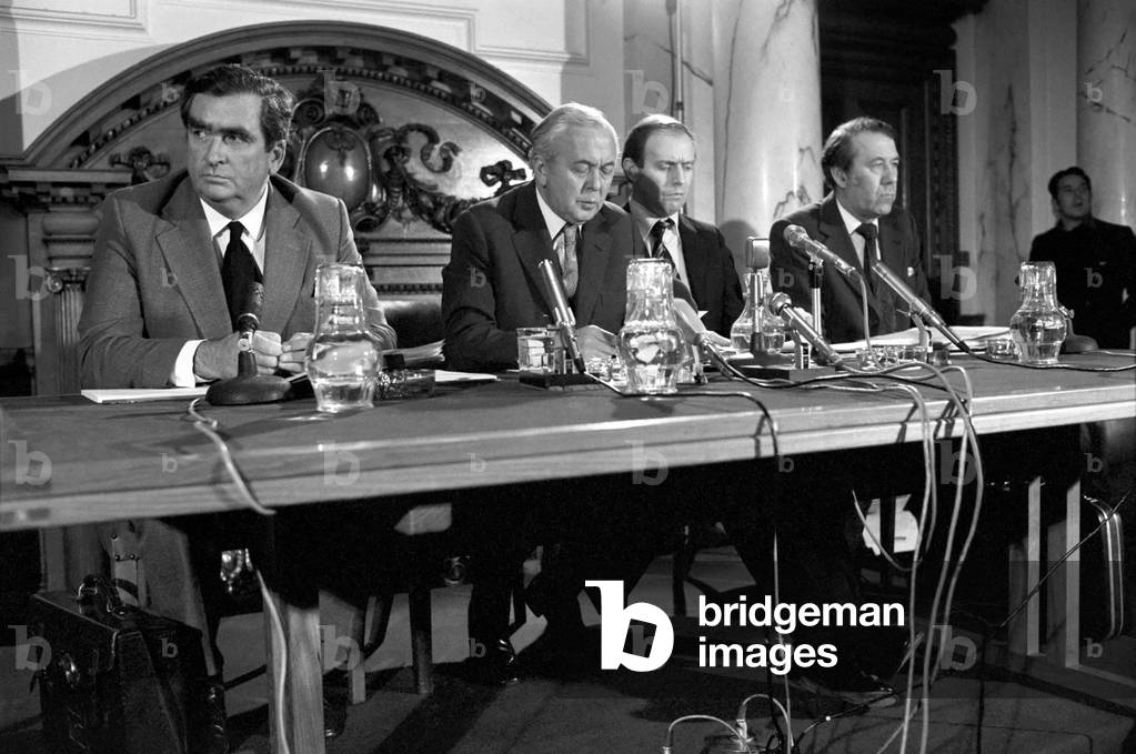 Prime Minister Harold Wilson with Chancellor of the Exchequer Denis Healey seen here making a statement at the Industrial Summit Conference. These conference become know as the G7 and then the G8 economic conferences, November 1975 (b/w photo)