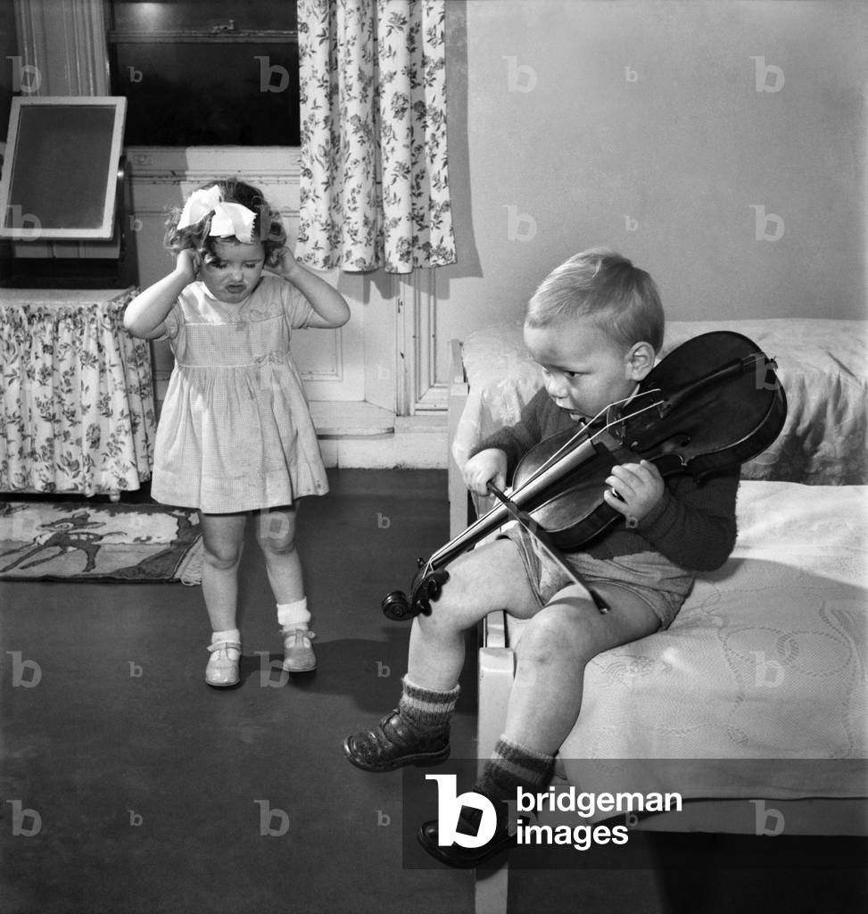 Children Playing with violin. March 1953 D1594