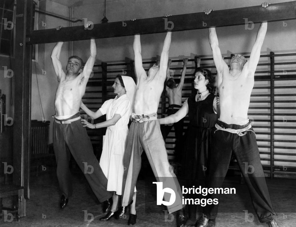 Injured coal miners undergoing fitness regime at a rehabilitation centre. 
September 1941