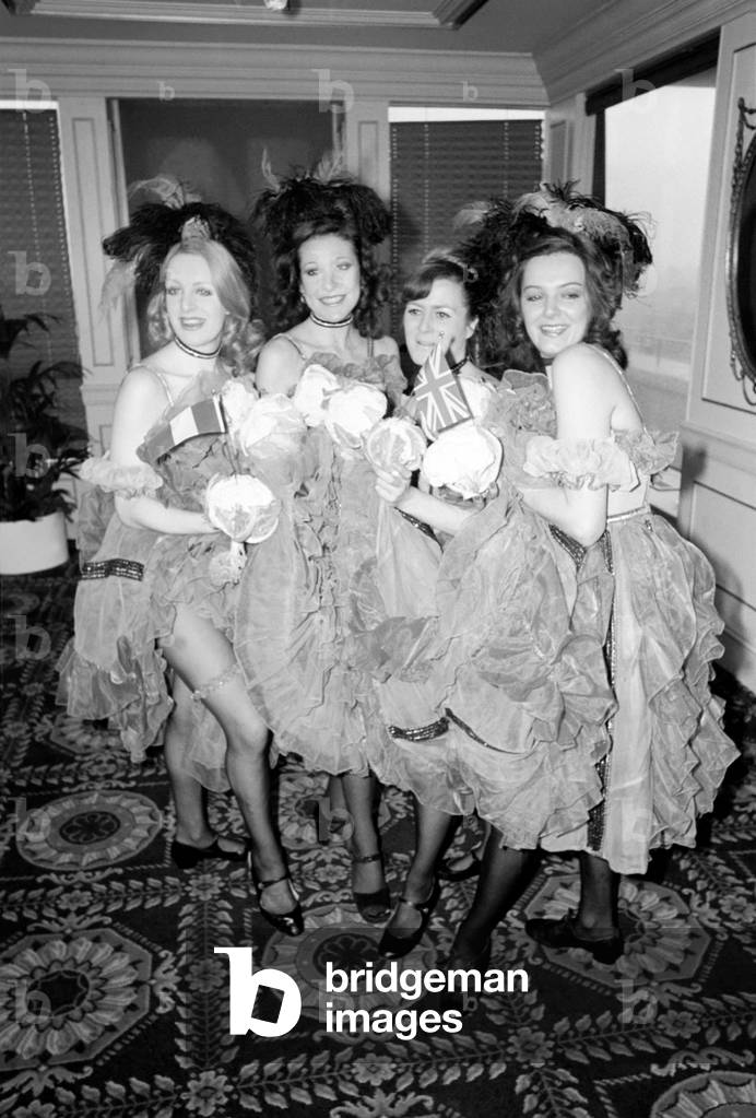 Can-Can Dancers: Table Decorations: Due to the Mild winter we are enjoying new Cauliflower from Brittany is reaching this country 5 weeks early. Four Can-Can dancers Biba Brookman, Diana Regal, Robbie Hart and Nicky Billiyard introduced the delicious vegetable is a spirited Can Can which they call the Cauli Can Can. January 1975