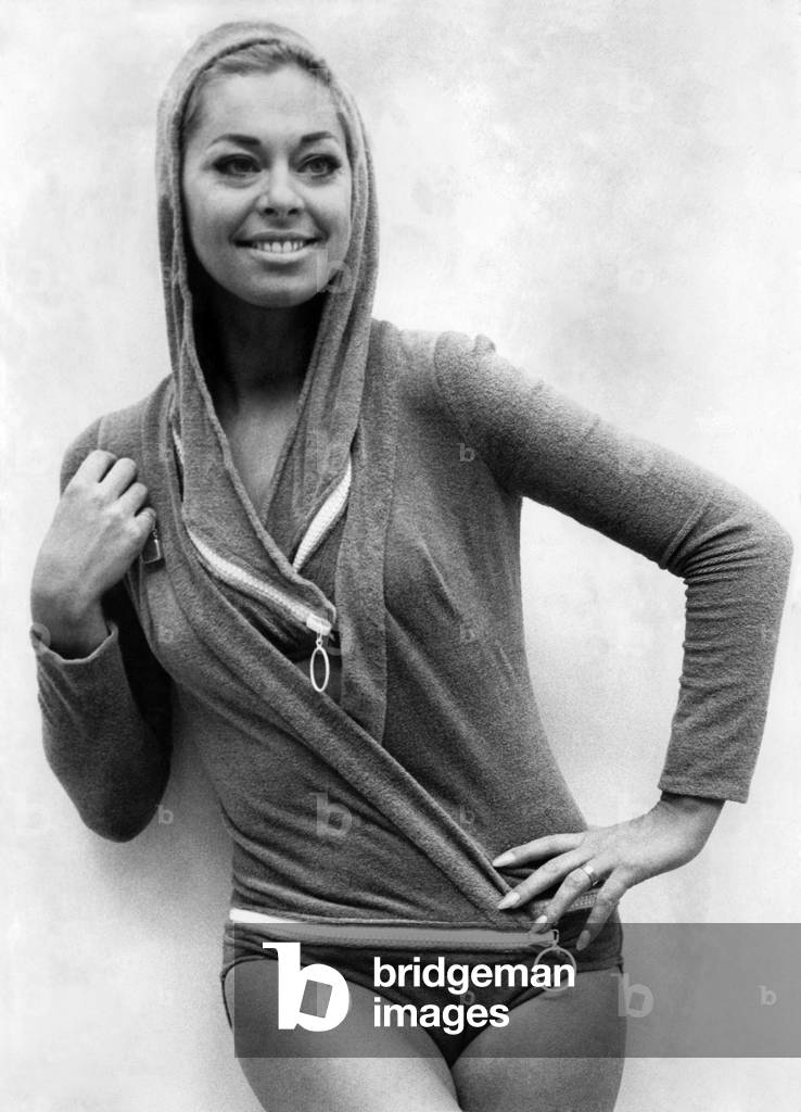 Actress Joan Crane was modelling a four-piece zip up swimsuit an stretch fabric by Heathcote November 1969