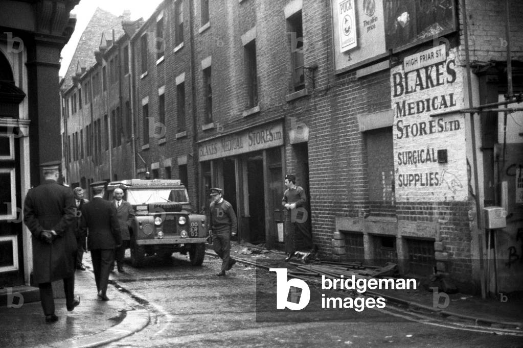 The scene at a demolition site on Friar Steet, near Newgate Street, Newcastle where a workman from demolition contractors G Blackett and Sons found 36 sticks of gelignite and detonators stuffed in a plastic bag, 6th January 1972(b/w photo)