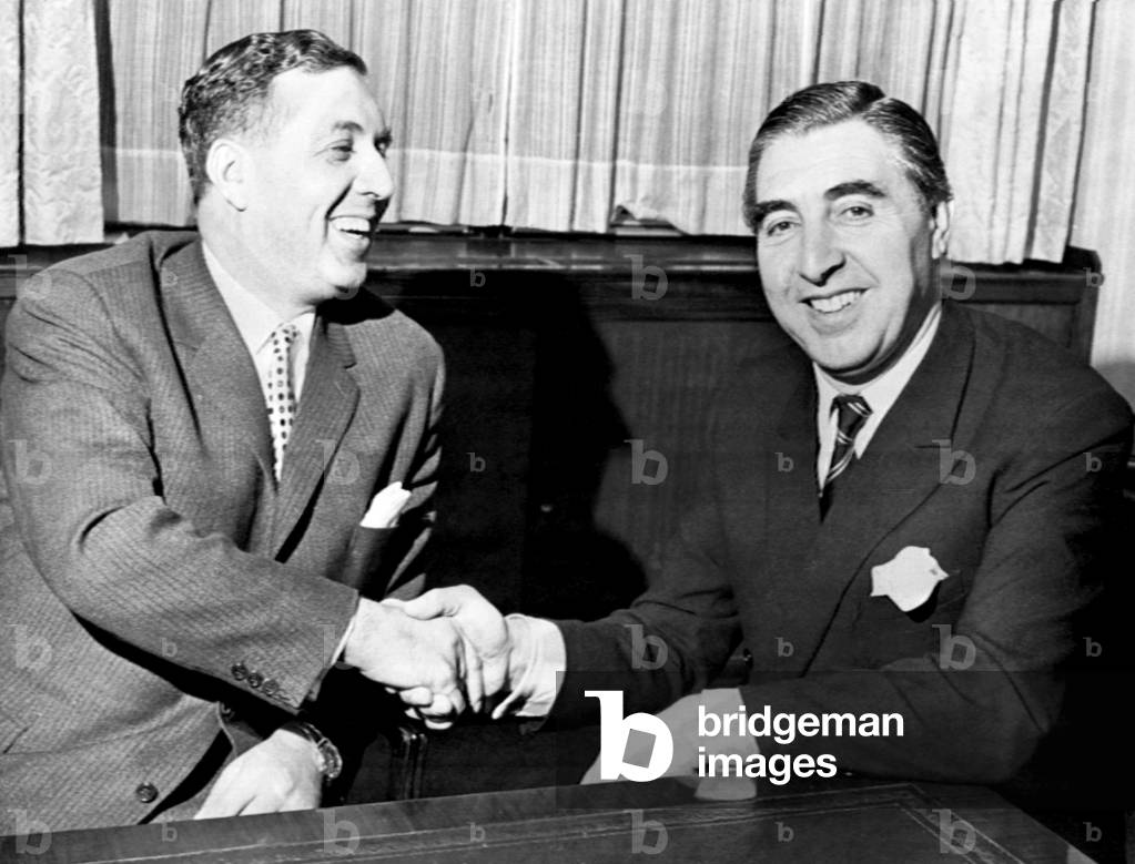 Doug Ellis (left), new Aston Villa Chairman, pictured shaking hands with financier Pat Matthews, Monday 16th December 1968 (photo)