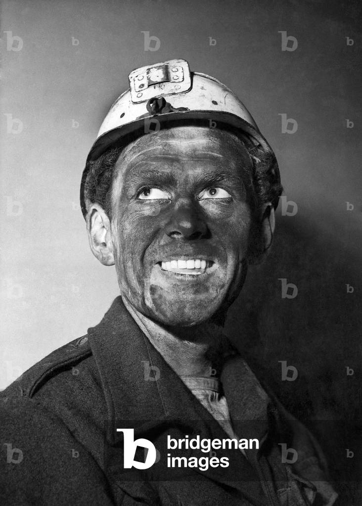 A miner goes to college. Bill Millington, 21, an underground filtter at Bickershaw Colliery, has just won one of a hundred scholarships awarded by the National Coal Board in mining, engineering and allied subjects. He is going to Nottingham University. September 1948 P017724
