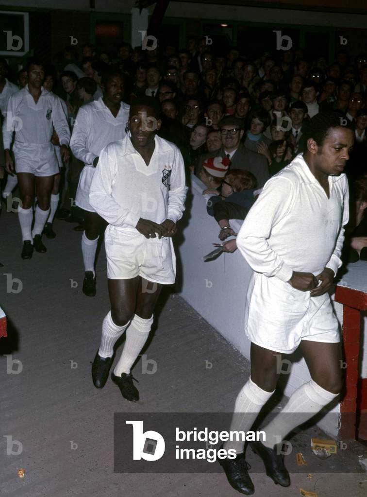 Brazilian footballer Pele playing for his club side SantosNovember 1969 (photo)