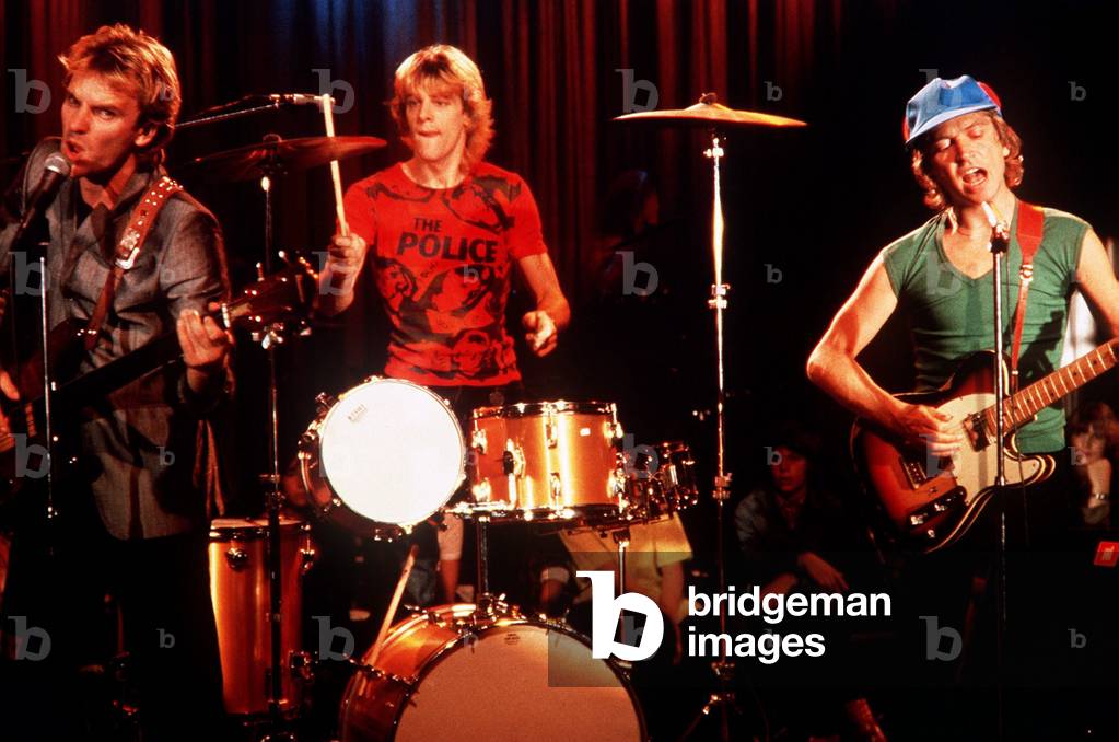 The Police Rock Group performing live
Sting, Andy Summers, and Stewart Copeland