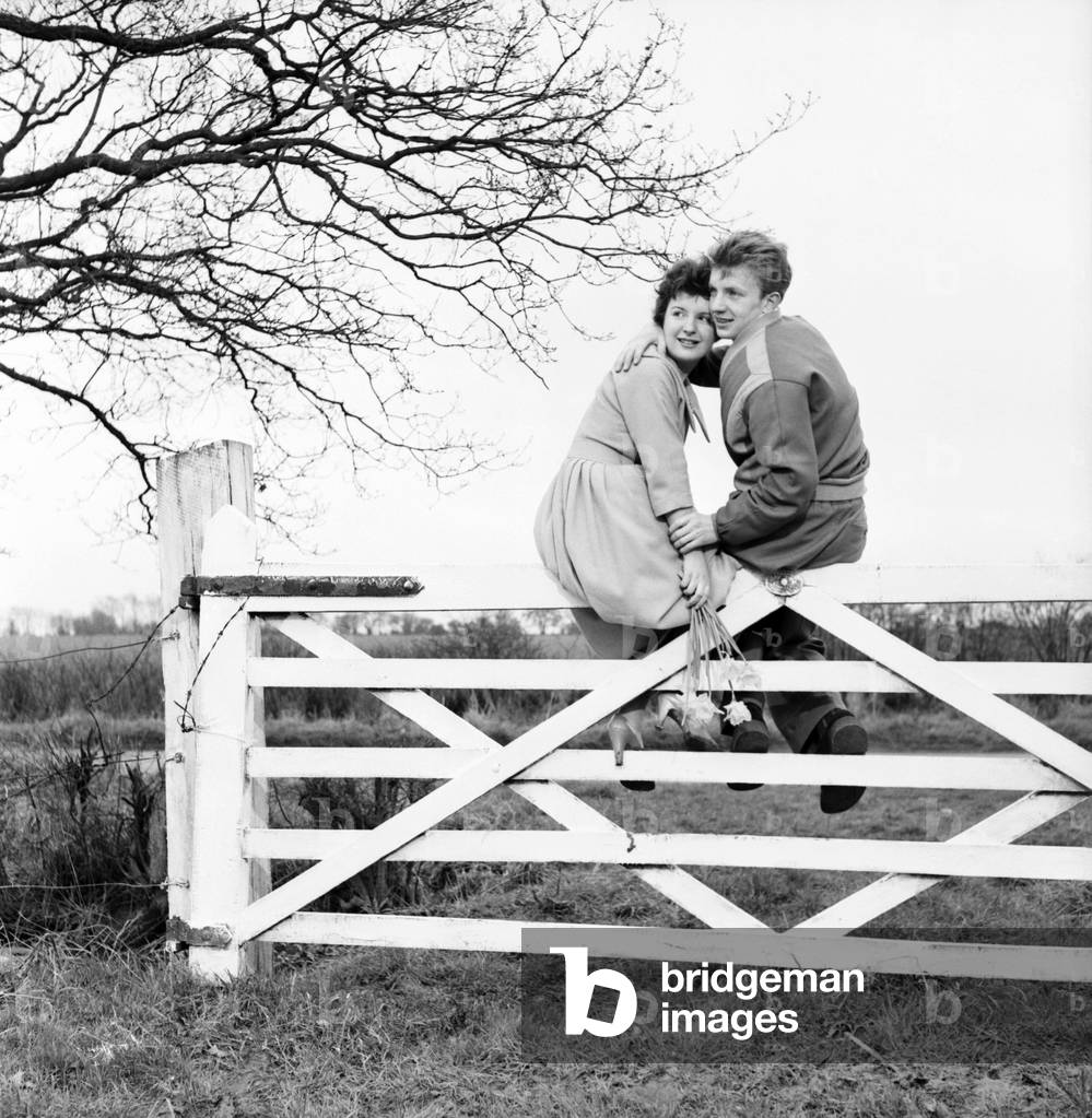 Romantic couple take a stroll in the country side. Richard Camp and Diane Ford, c.1950
