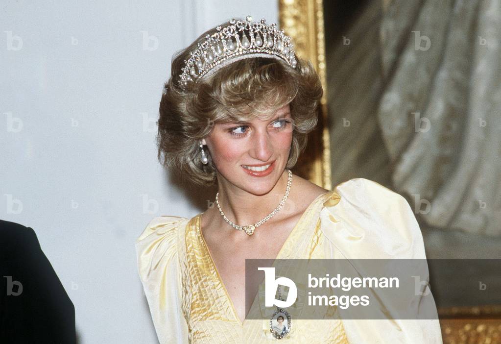 Princess Diana in New Zealand Government House Ball Wellington wearing a yellow dress and tiara
April 1983