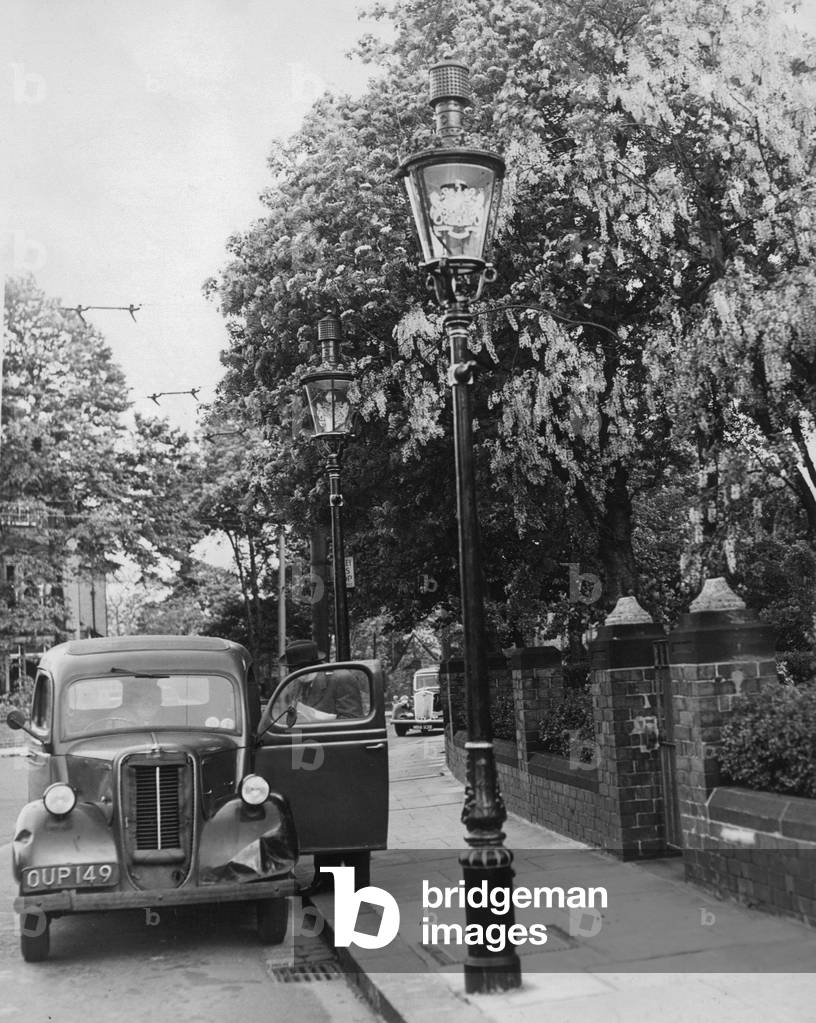 Gas light, street lighting, lamp-posts in 1956.