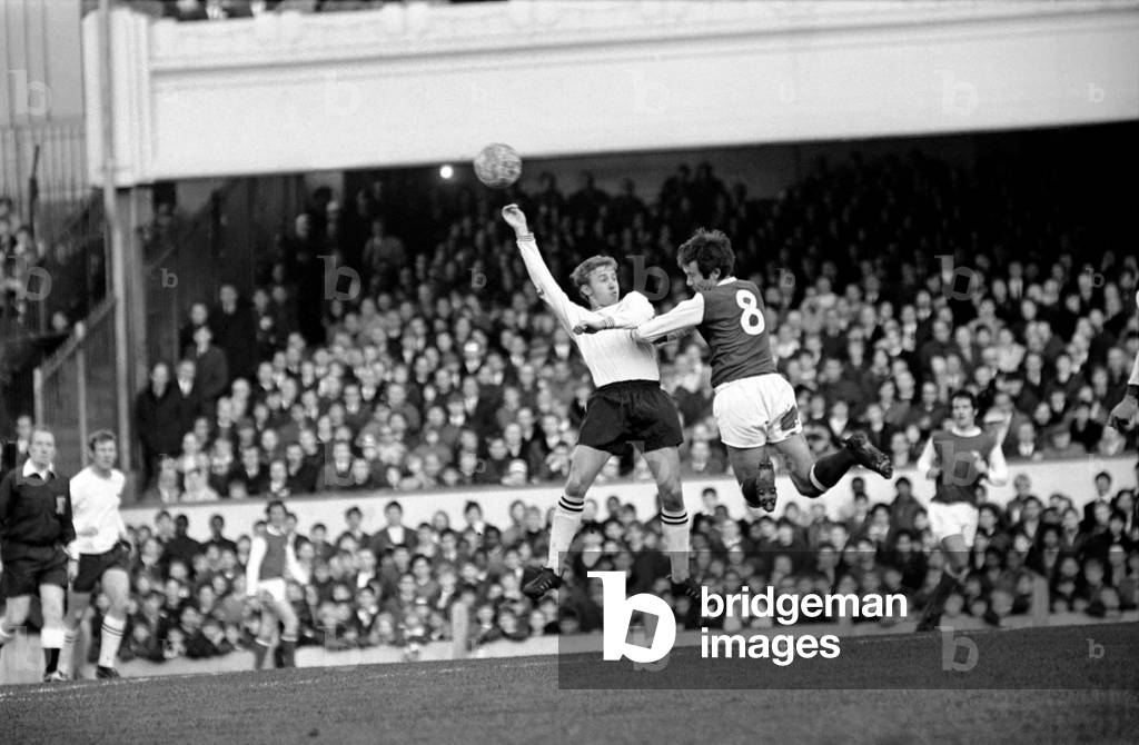 English League Division One match at HighburyArsenal 4 v Derby County 0. Arsenals's Jon Sammels (8) heads the ball away from John McGovern. November 1969 (photo)