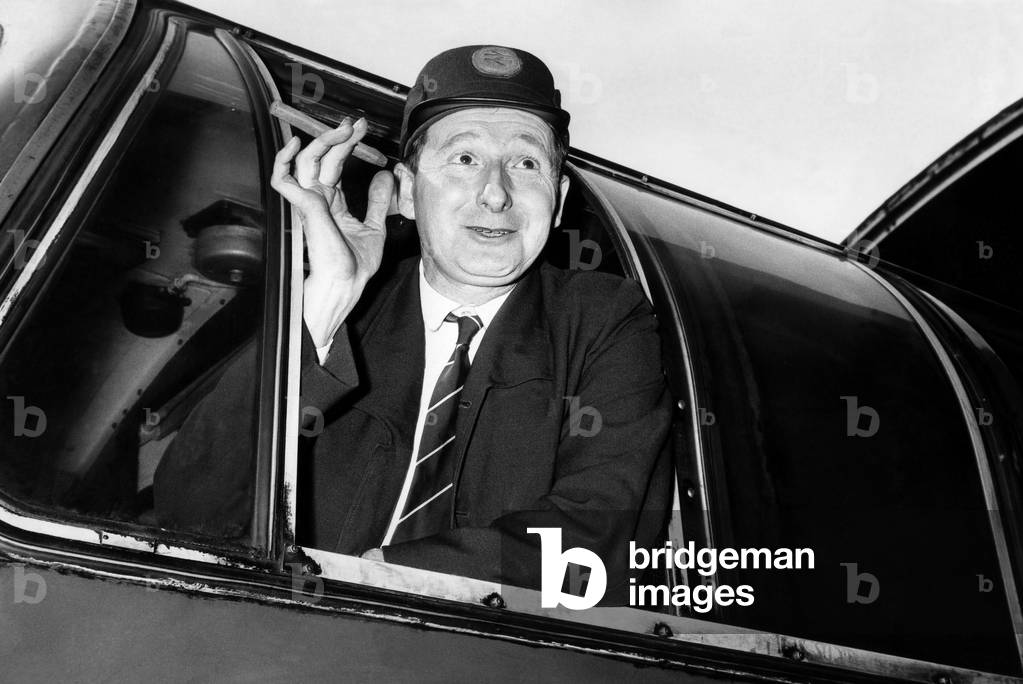 Driver Mr. Fred Hart gives the 'thumbs up' after his record breaking trip on the new service linking London and the North East on 4th May 1970 (b/w photo)