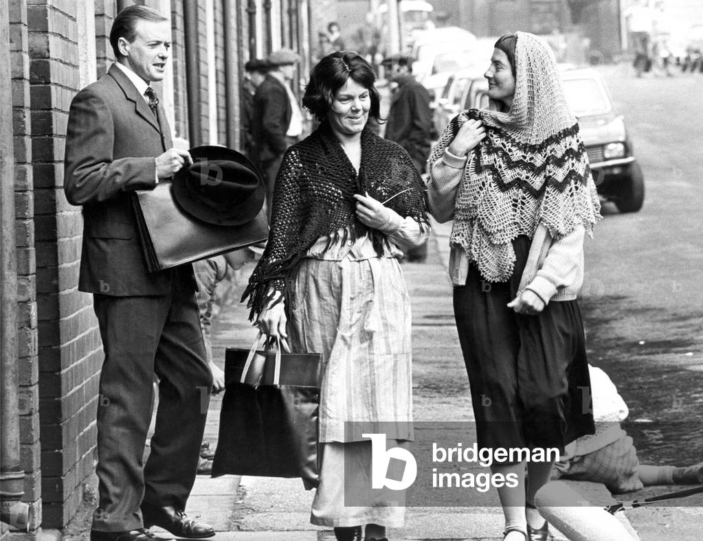 Actor James Bolam and cast in Joan Street, Wallsend, start filming the television series When The Boat Comes In in 1976 (b/w photo)