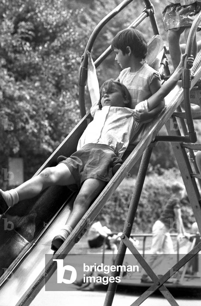 Children play on a slide at The War Memorial Park, Coventry.
28th August 1967
