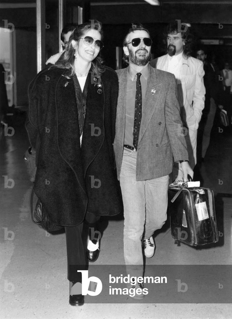 Ringo Starr and wife Barbara pictured at Heathrow on Saturday December 7. December 1985 P017285