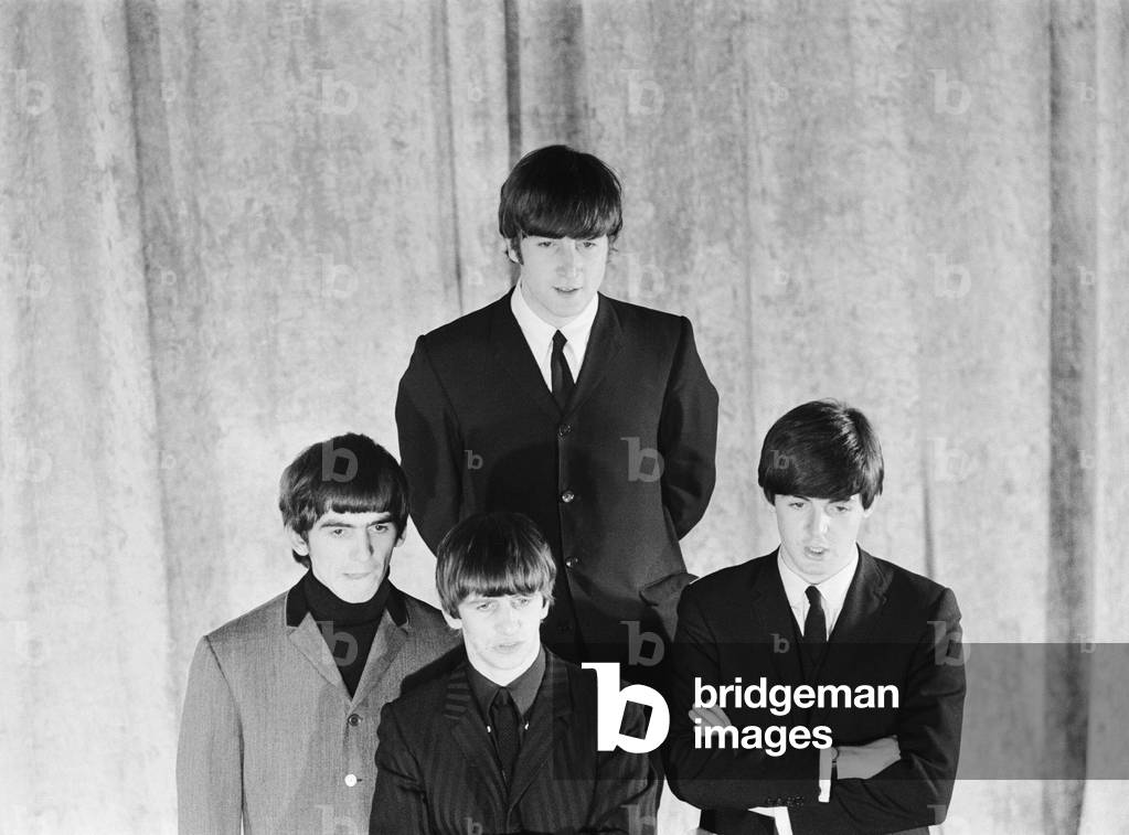 British pop group The Beatles pose for photographers at a CBS photocall in New York before the band's appearance on the Ed Sullivan television show. 
9th February 1964.