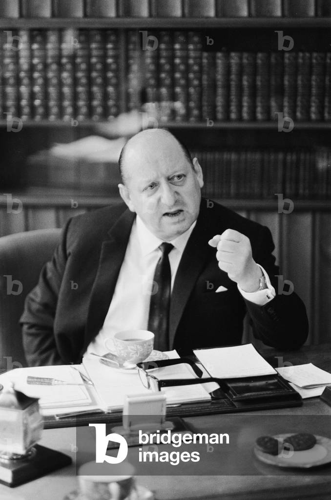 Media mogul Lew Grade pictured in his office at the ATV studios in Great Cumberland Place, London. 21st February 1964 (b/w photo)