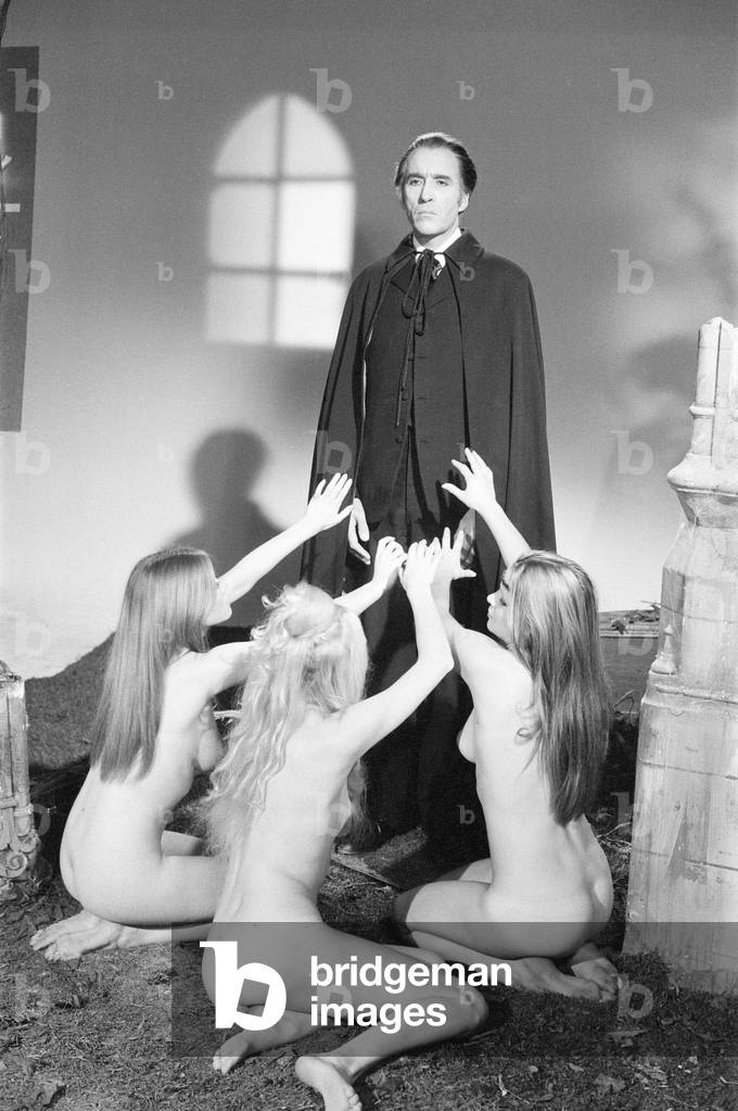 Christopher Lee, being photographed for poster, dressed as character Dracula in film, Dracula A.D. 1972, at Elstree Studios, Hertfordshire, 24th October 1971.