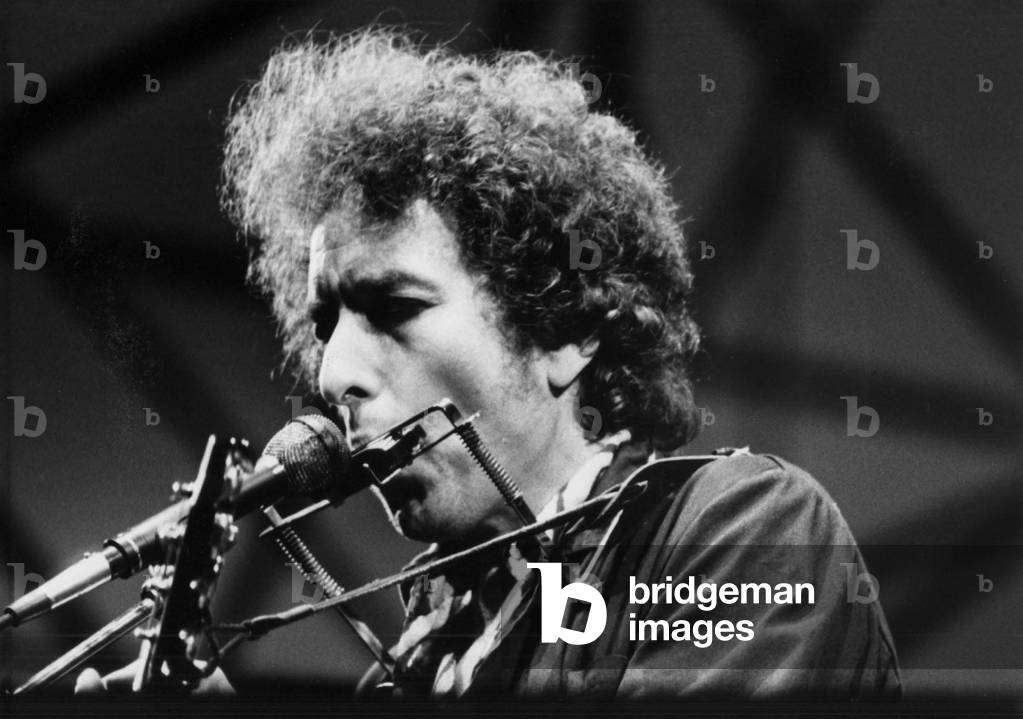 Singer Bob Dylan in concert at St James's Park, Newcastle, 5th July 1984 (b/w photo)