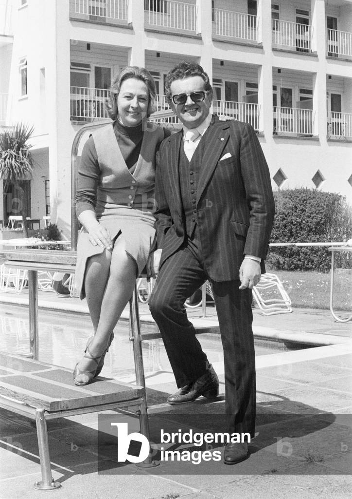 British musician Ronnie Ronalde pictured outside his hotel in St Martin, Guernsey with his wife Rosemarie.
14th May 1978.