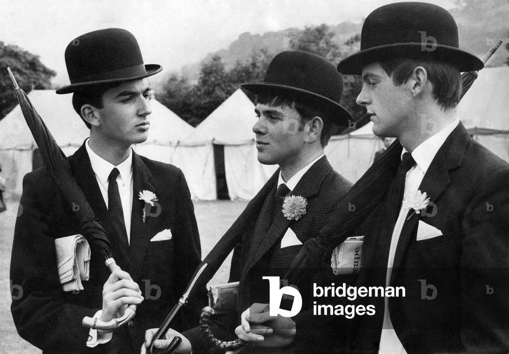 The bowler hat brigade. Left to Right Boys of Oswestry High School for boys and girls wearing British national dress costume left to right Rees, Roger Mitchell, Monty Morris. July 1965