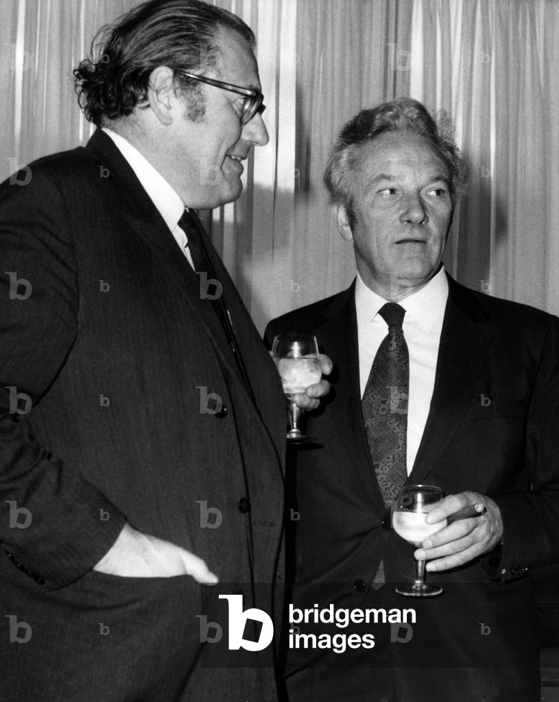 Hugh Cudlipp, Chairman of the International Publishing Corporation, pictured with Home Secretary, Reginald Maudling, at Reception, 8th November 1971 (b/w photo)