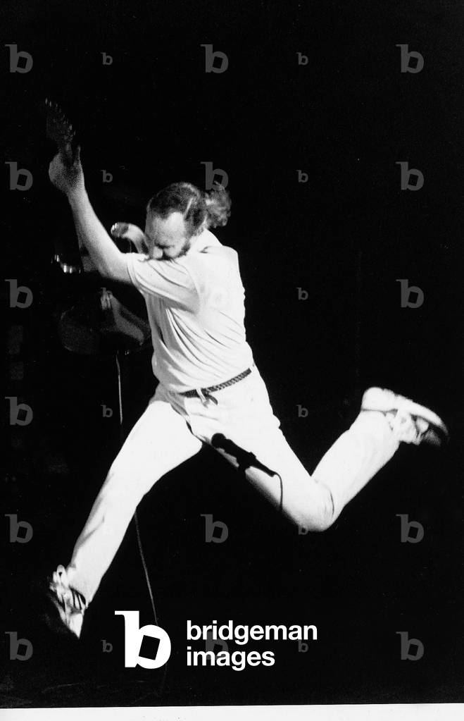 The Who pop guitarist Pete Townshend leaping 1989