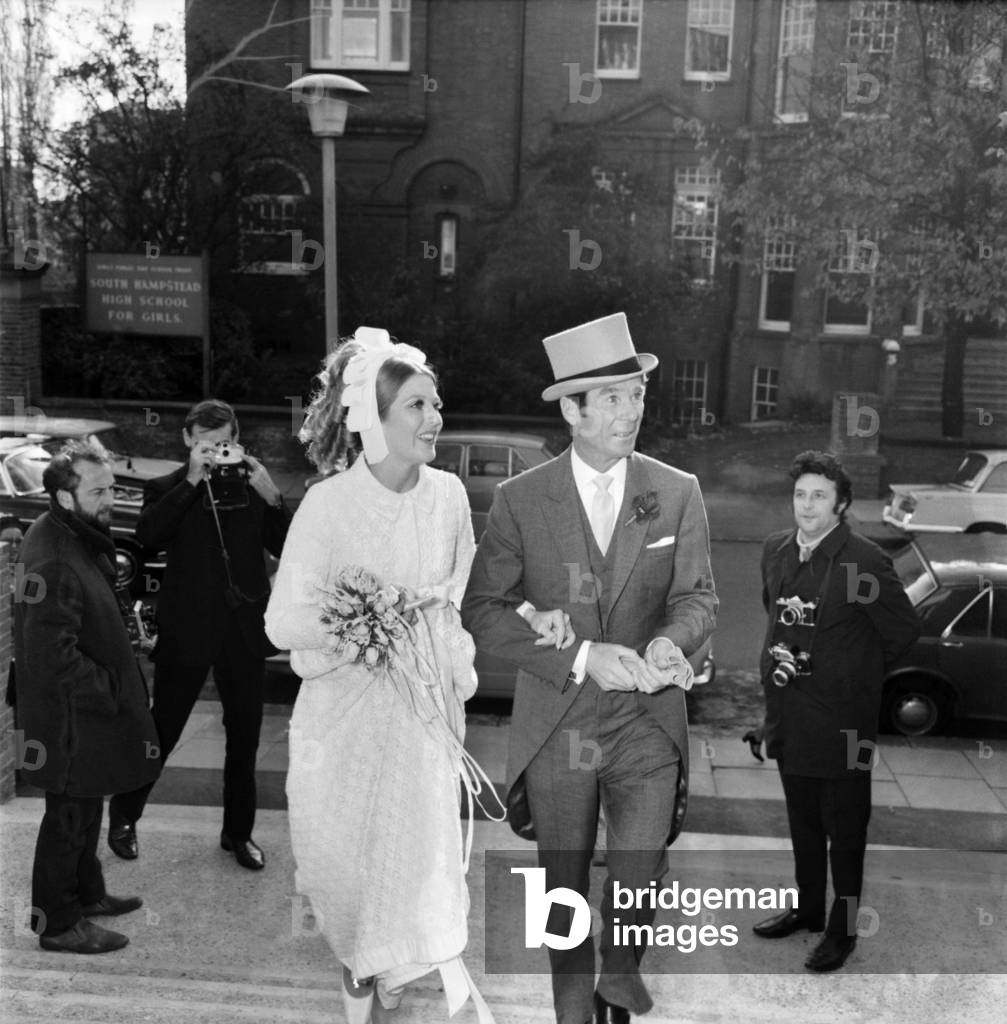 Mike Yarwood, 27, the impressionist and comedian married Sandra Burville aged 23, at the Church of St. Thomas Moore, Swiss Cottage, London. 
November 1969