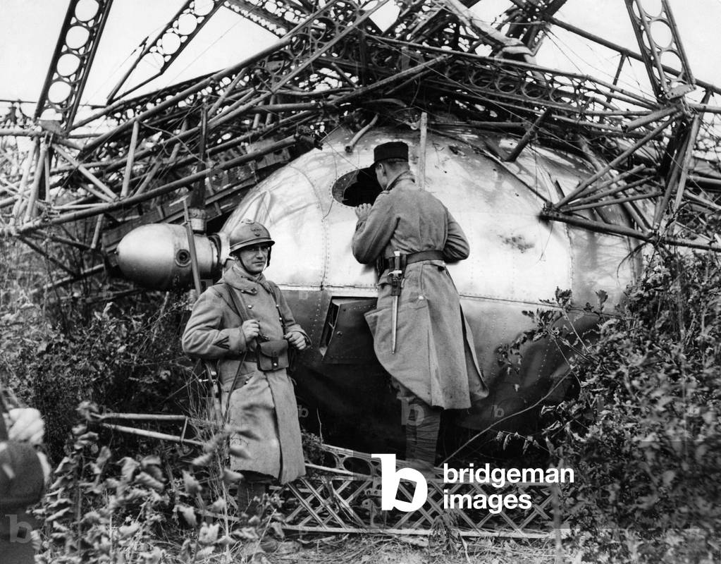 French soldiers at the scene of the crash of the British airship R101 in the French village of Beauvais
October 1930