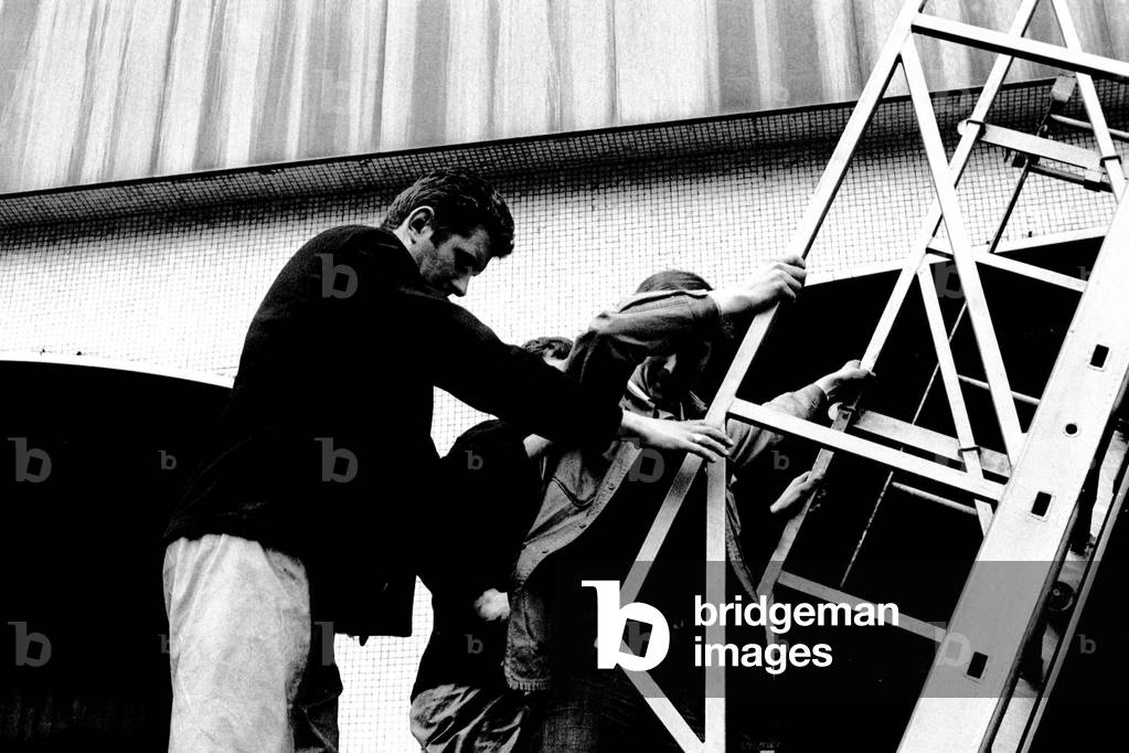 Window cleaners Richard Pendleton and John McKenzie were trapped for 20 minutes after their cradle broke down on the Gallowgate side of the Scottish and Newcastle Breweries building, 21st April 1970 (b/w photo)