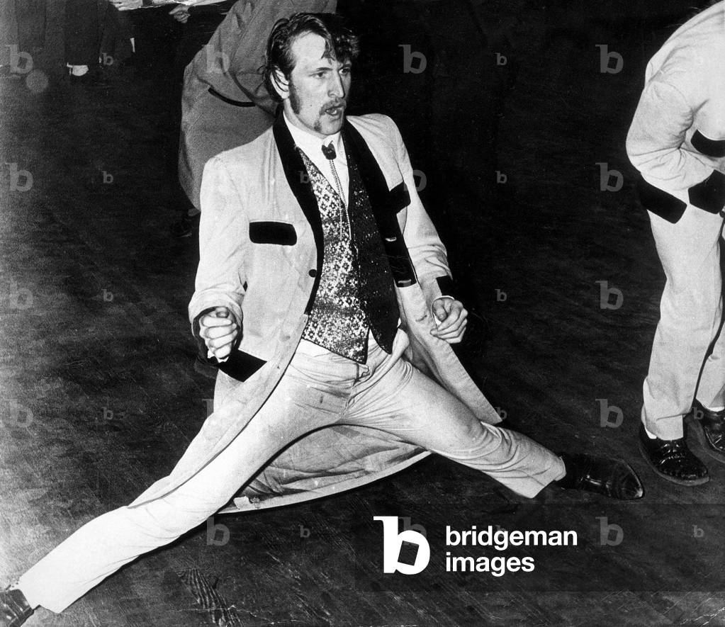 Gateshead's Phil Chicken shows his rock 'n' roll moves at a revival on Tyneside in 1974 (b/w photo)