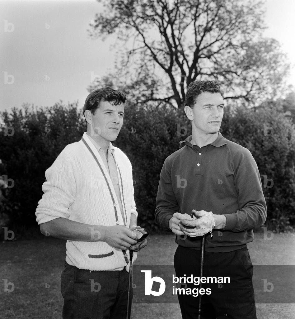 TT Riders Jim Redman (light shirt) and Phil Read playing golf. 29th June 1965 (b/w photo)