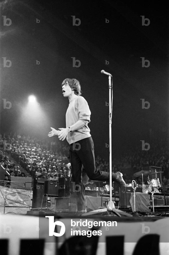 The Rolling Stones perform at the Mew Musical Express Poll Winners All Star Concert at Wembley. Mick Jagger. 26th April 1964 (b/w photo)