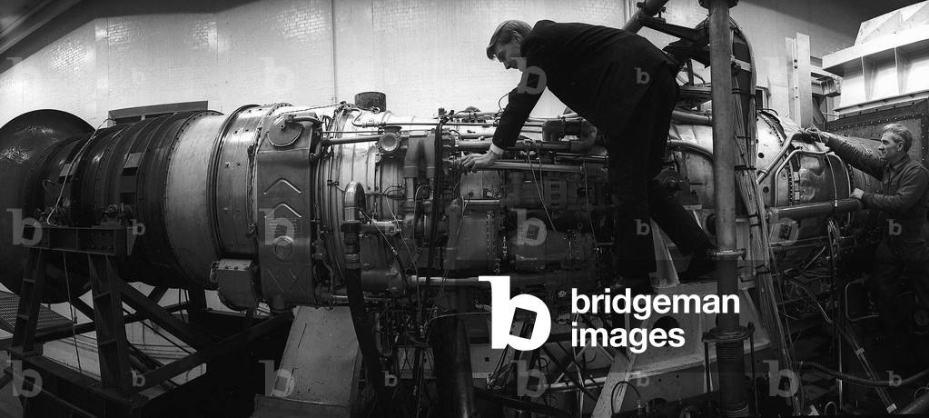 Engineers at the Bristol Siddeley factory working on the Rolls Royce Olympus engine, the power behind Concorde, March 1963 (b/w photo)