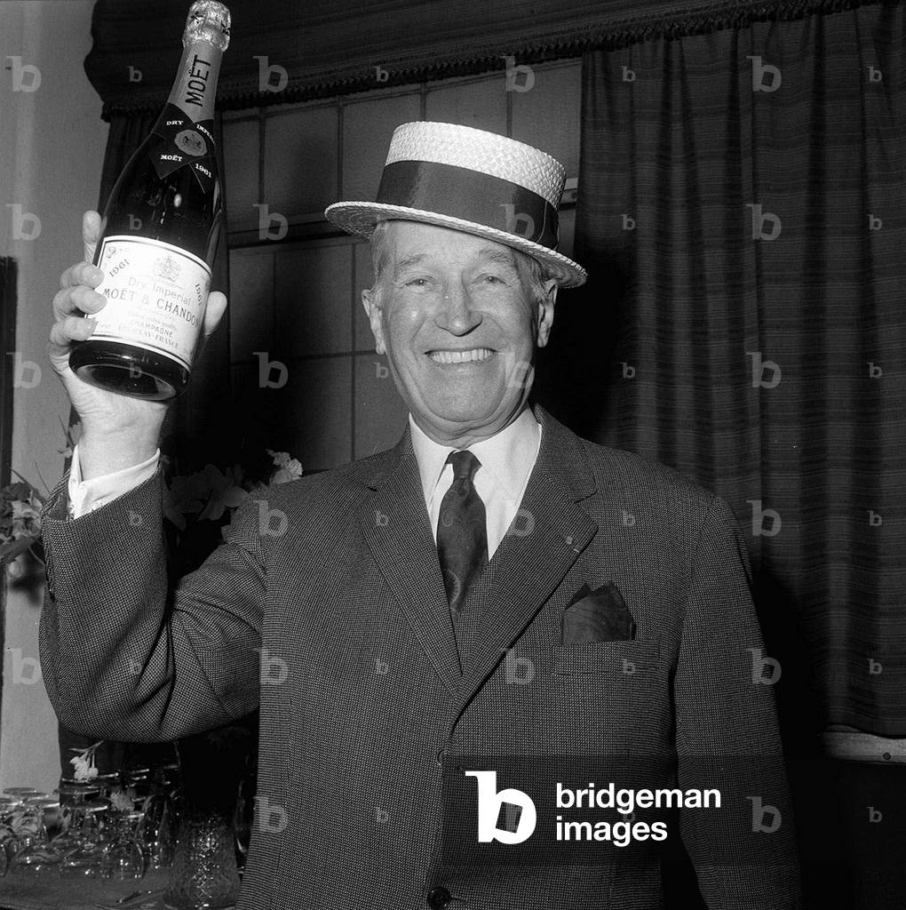 Maurice Chevalier Acto with people from the audience at the Palladiumr, February 1968 (b/w photo)