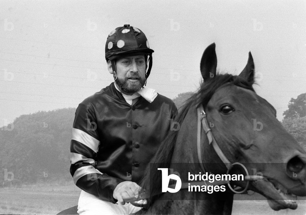 Clement Freud riding on his own horse 