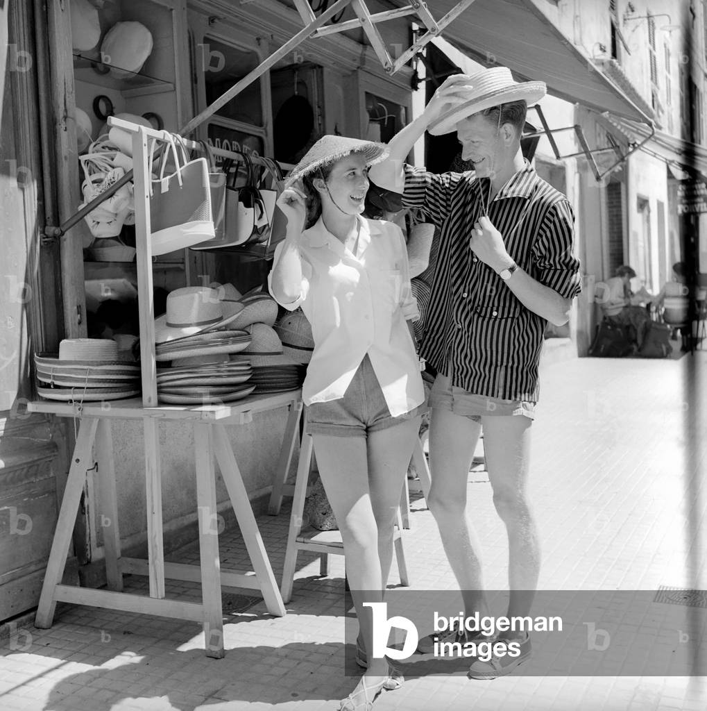 Holidays: Holidaymakers: Tourists explore the fishing villages of Corsica, August 1957 (b/w photo)