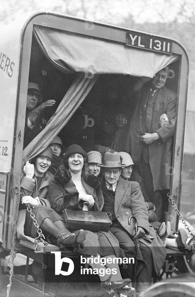 Commuters using make shift public transport to get to work on the second day of the General Strike. The national dispute came about after negotiations between the miners and mine owners failed over wages and the strike began on 3 May 1926. Millions obeyed the strike call, bringing transport systems to a halt while newspapers were not printed. The government responding by using volunteers to run trains and buses and sent in troops to move supplies from the London docks. There were clashes between police and crowds in many areas and at least 4000 strikers were arrested. There were attacks on buses and trains, including the derailing of the Flying Scotsman. The strike was called off unilaterally by the TUC on 12 May with no guarantees of fair treatment for the miners who fought on to bitter defeat in October, 4th May 1926 (b/w photo)