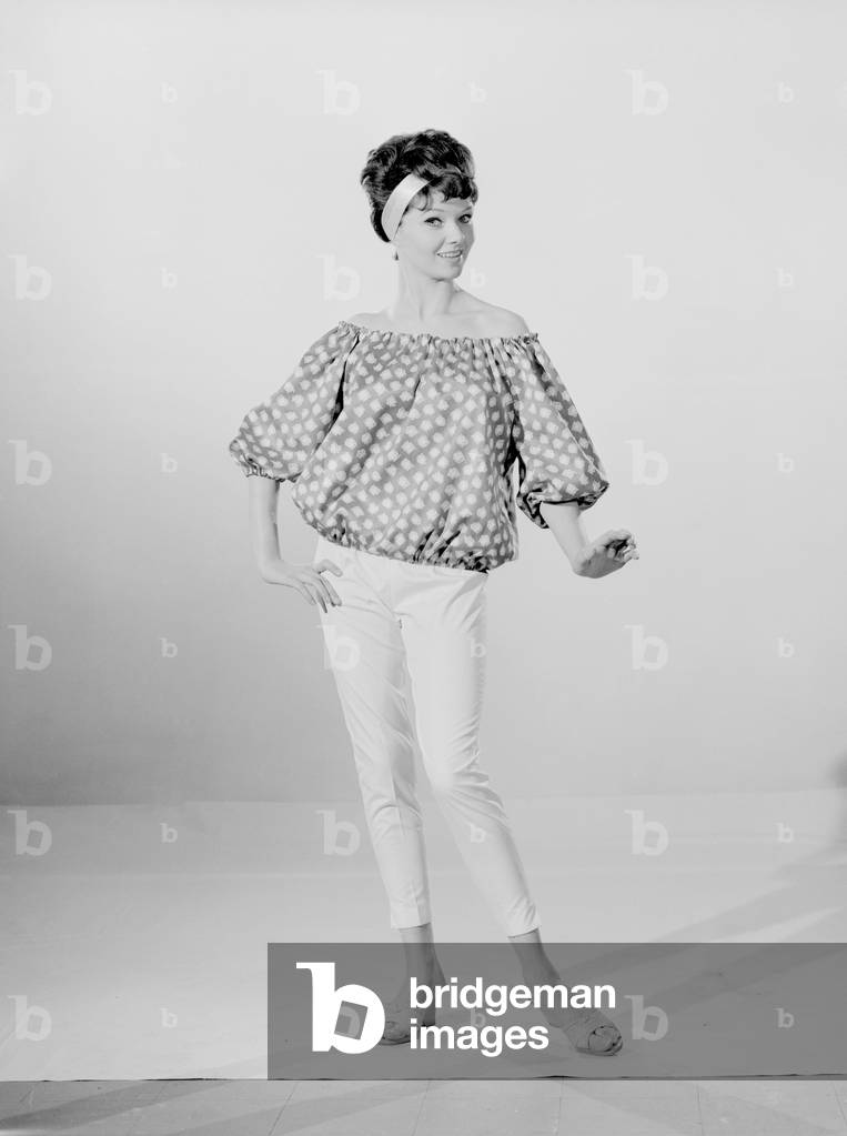 Reveille Model Meriel Weston modelling a spotted blouse May 1961 (b/w photo)